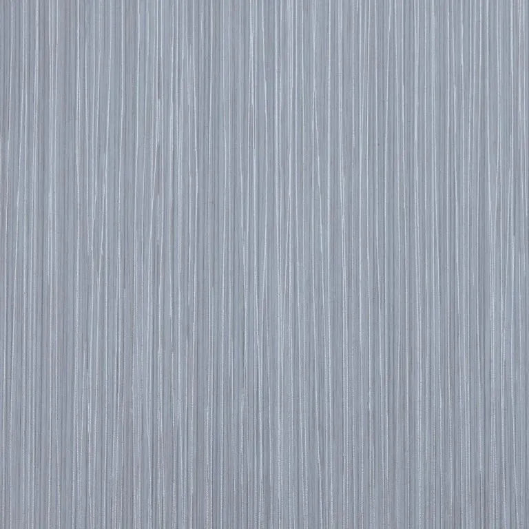 A close-up of a textured surface with vertical gray and white striations, resembling brushed metal or fine wood grain.