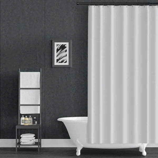 Bathroom with a white shower curtain, bathtub, and towel rack against a dark gray wall.