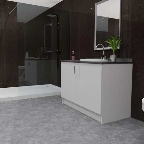 A modern bathroom vanity setup with a white cabinet, dark countertop, integrated sink, and chrome faucet, shown in a dark tiled bathroom with a walk-in shower and mirror.