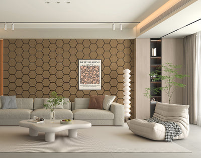 Modern living room with hexagonal wall pattern, gray sofa, and decorative elements.
