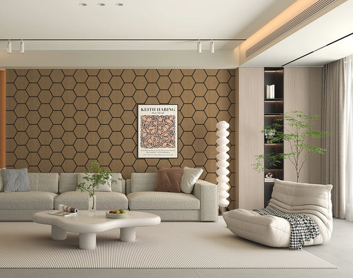 Modern living room with hexagonal wall pattern, gray sofa, and decorative elements.