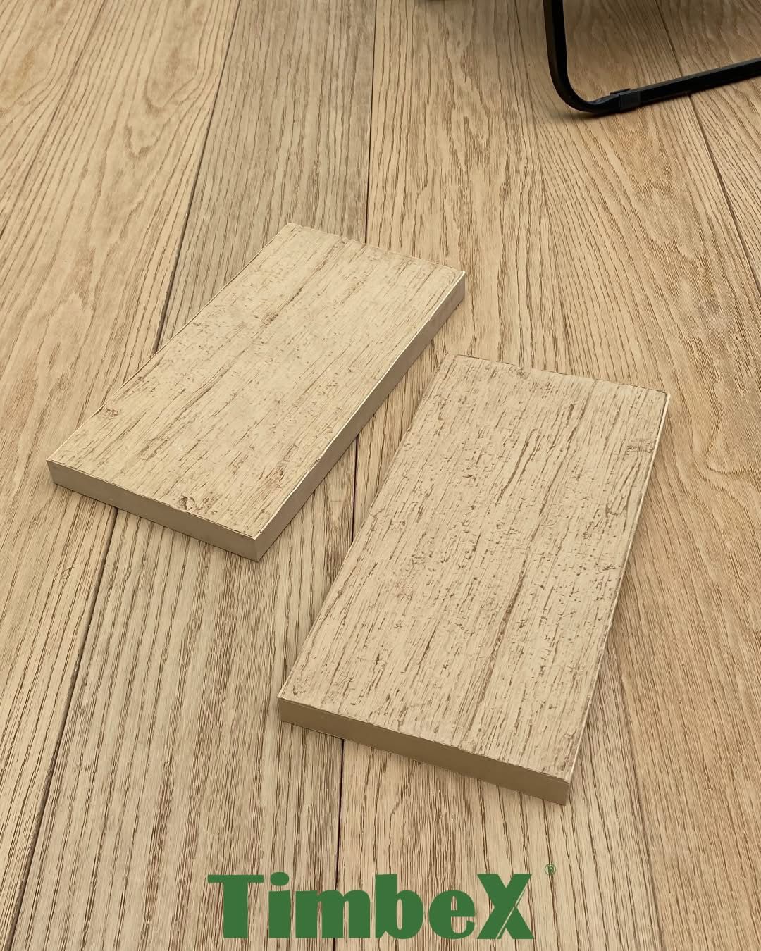 Honey Maple TimbeX composite decking with matching sample boards showing the enhanced wood grain