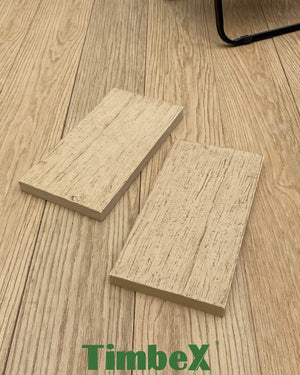 Honey Maple TimbeX composite decking with matching sample boards showing the enhanced wood grain