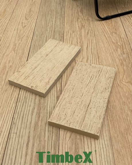 Honey Maple TimbeX composite decking with matching sample boards showing the enhanced wood grain