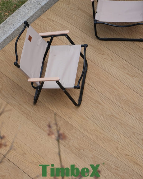 Honey Maple TimbeX composite decking with contemporary outdoor dining furniture