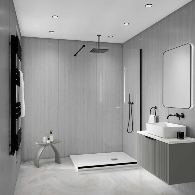 A modern bathroom interior with a walk-in shower enclosure, white vessel sink, wall-mounted vanity, large mirror, black fixtures, and light gray wood-look walls and floor.