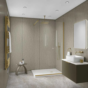 A modern bathroom interior with a walk-in shower enclosure, vessel sink, wall-mounted vanity, gold-toned fixtures, and warm beige stone-like walls and floor.