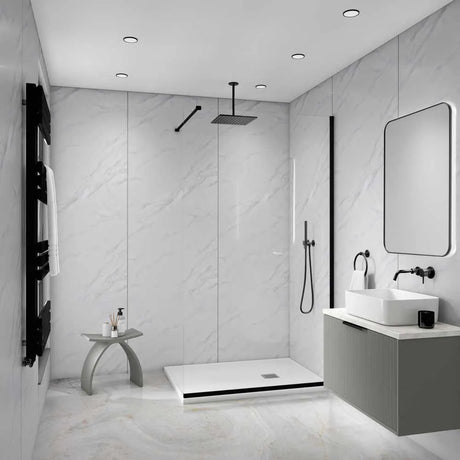 Modern bathroom interior with a walk-in shower area, white marble-look walls and floor, a white vessel sink, gray vanity, black fixtures, and a large rectangular mirror.