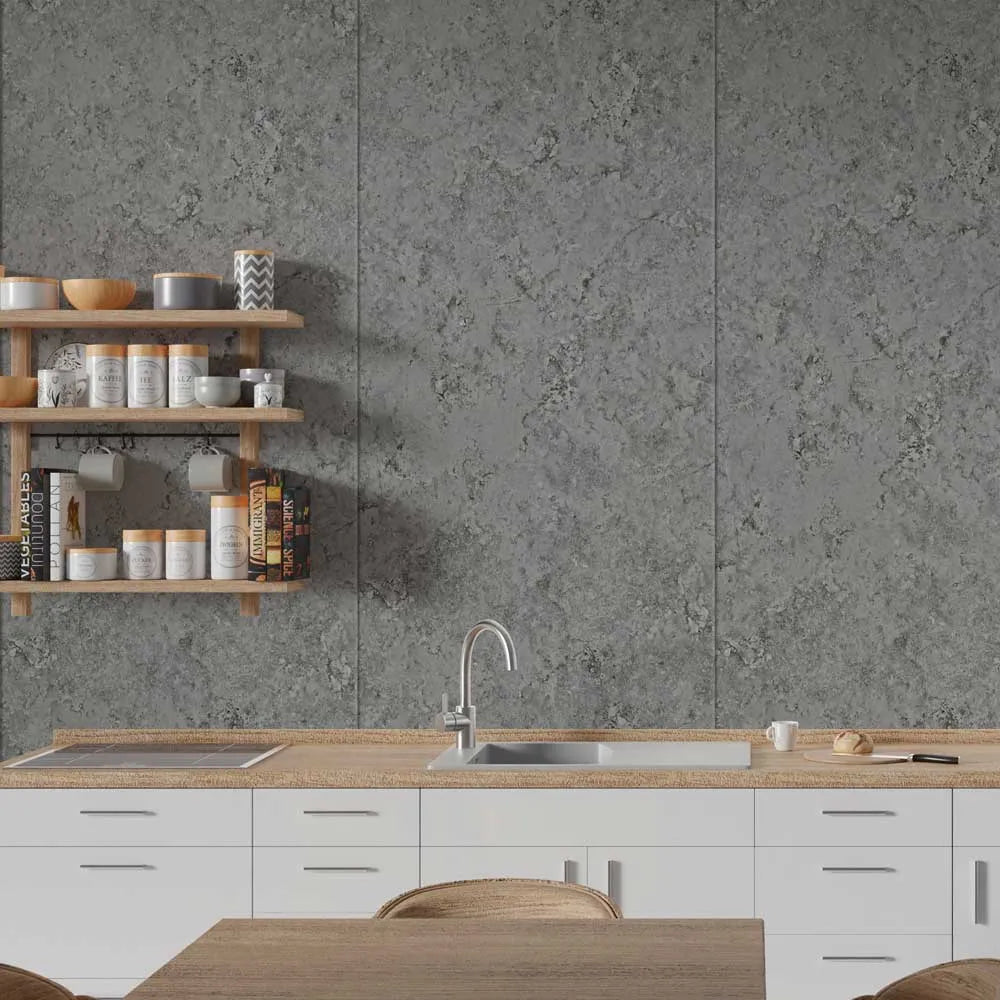 Gray stone-look wall tiles installed in a modern kitchen setting with white cabinets, a wooden countertop, and floating wooden shelves.