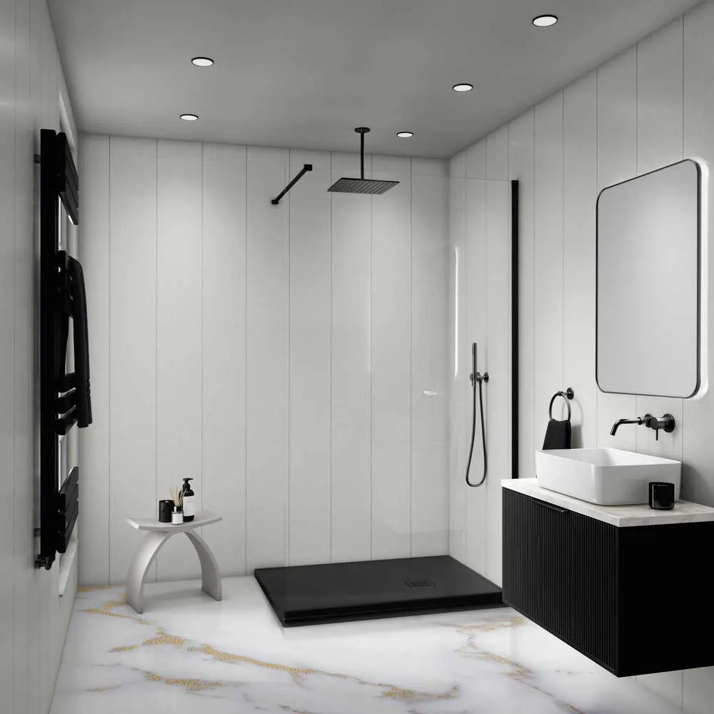 Modern bathroom with black and white fixtures, including a shower and sink.