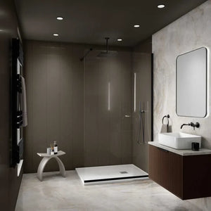 A modern bathroom interior with a walk-in shower enclosure, white vessel sink, dark wood vanity, and a large rectangular mirror on a light stone wall.