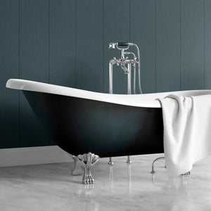 A freestanding bathtub with a glossy black exterior, white interior, and ornate silver claw feet, set against a dark blue-gray paneled wall with a white towel draped over the side.