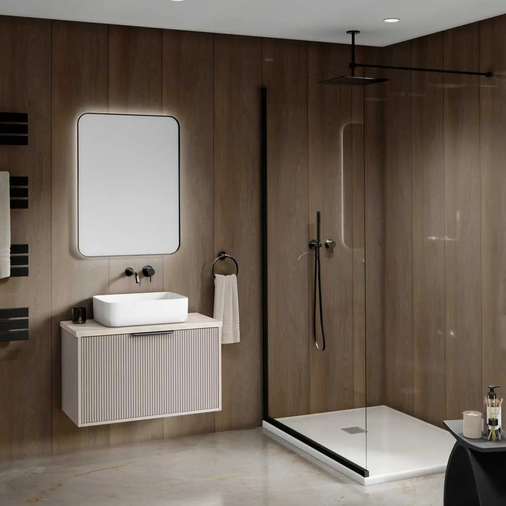Modern bathroom interior with a floating white vessel sink, rectangular mirror, Kona woodgrain upvc walls, a glass shower enclosure, and a white walk-in shower base.