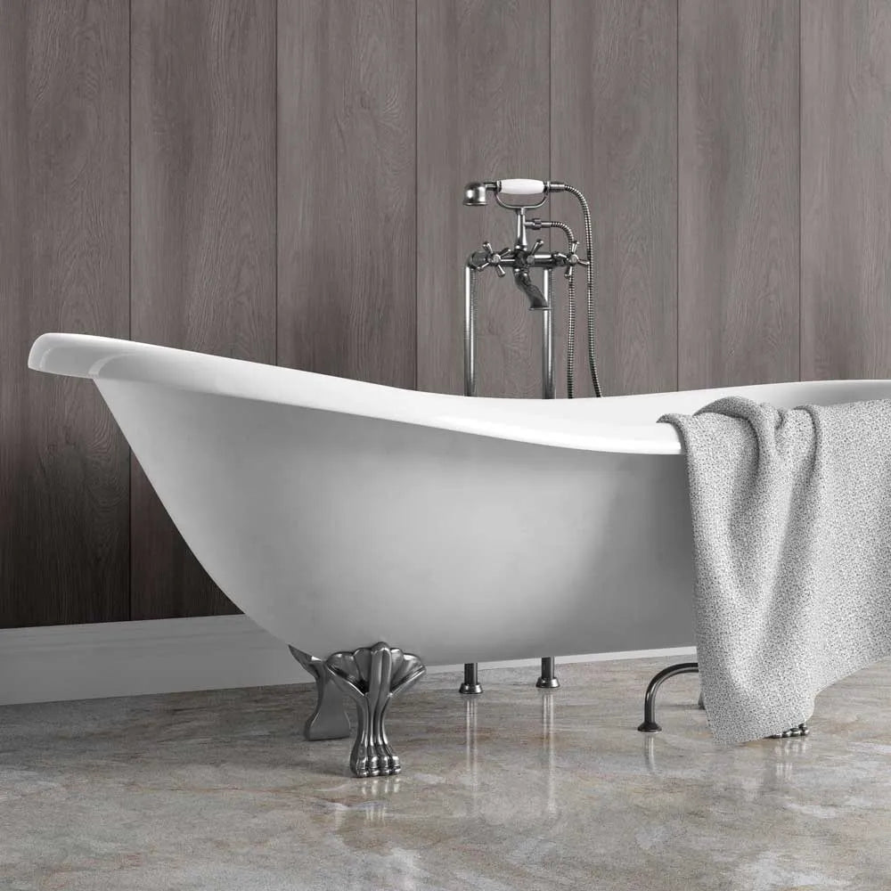 White freestanding bathtub with a gray towel against a carbon woodgrain upvc wall.