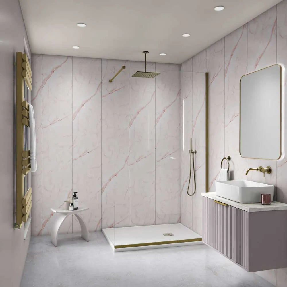 Modern bathroom with pink marble walls, shower, sink, and mirror.