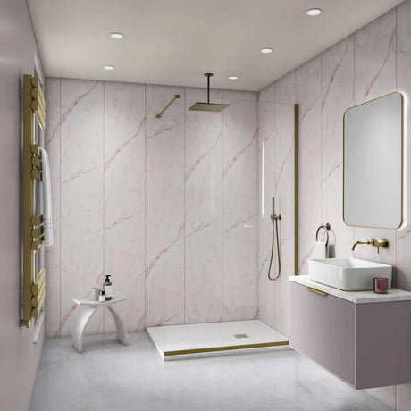 Modern bathroom with pink marble walls, shower, sink, and mirror.
