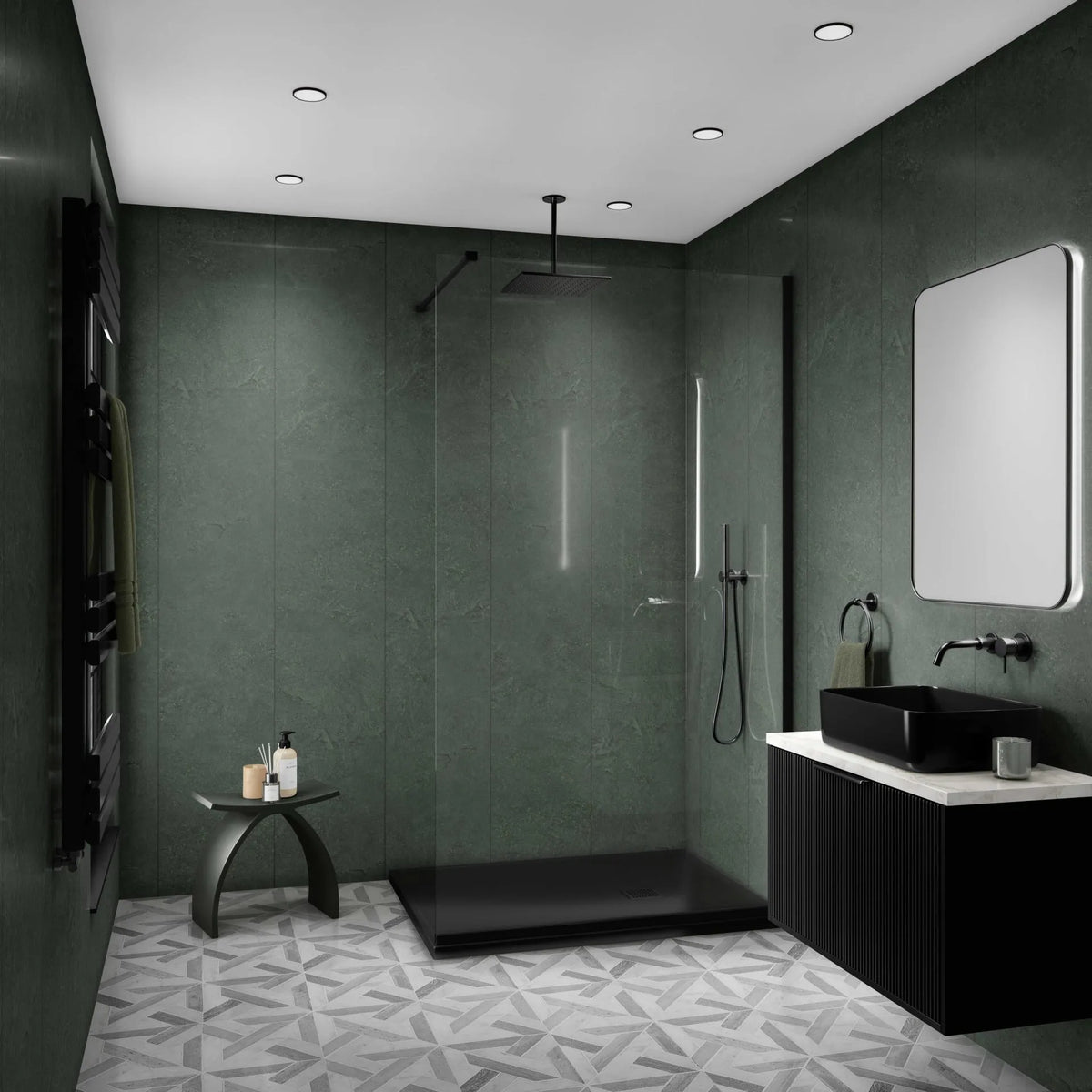 Modern bathroom interior with dark green tiled walls, a glass walk-in shower enclosure, black vessel sink and vanity, white marble countertop, patterned gray floor, and recessed ceiling lights.