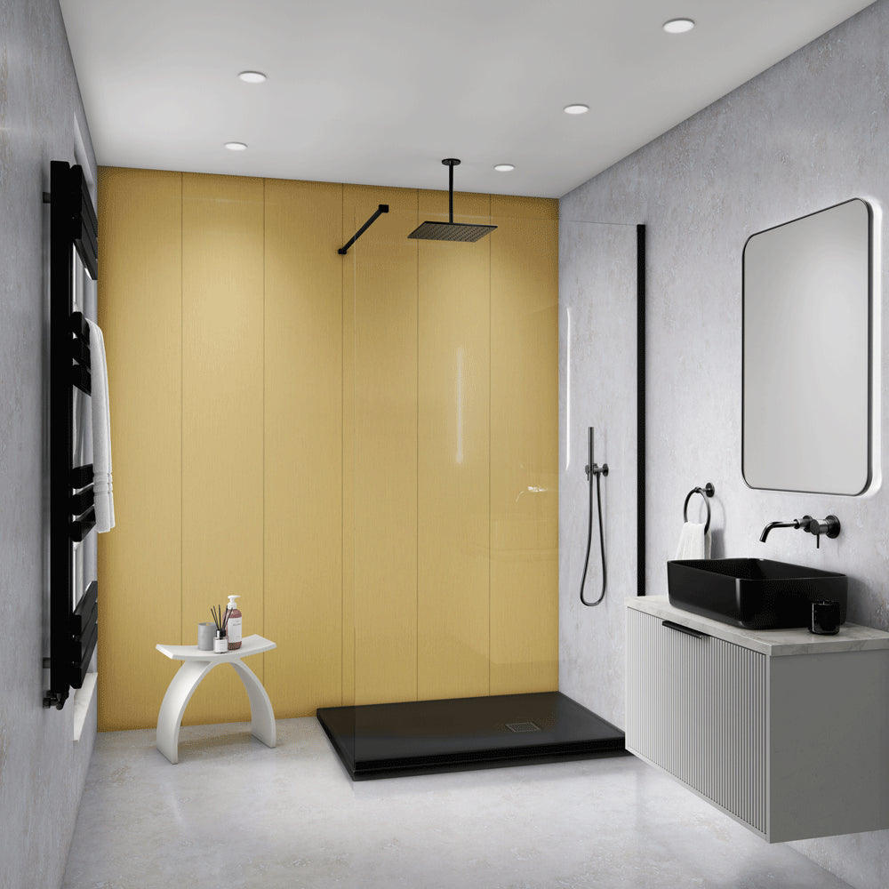 Modern bathroom interior with a large mustard-yellow wall panel behind a walk-in shower area, gray textured walls, a black shower head and floor tray, a white vanity with a black sink, and a rectangular mirror.
