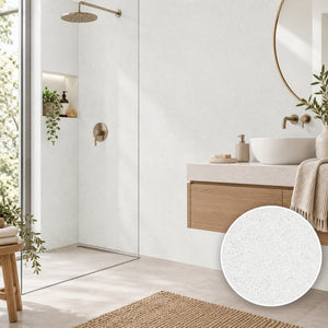 A modern bathroom scene with a white vessel sink, floating wood vanity, glass shower door, and a circular inset showing a white speckled stone or tile texture sample.