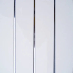 A close-up of a white panel door with two vertical metallic chrome or silver-colored frames running down the center.